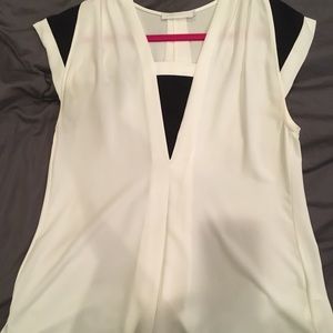 Softly flowing black and white blouse